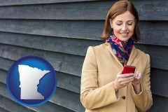 minnesota map icon and middle-aged woman using a cell phone
