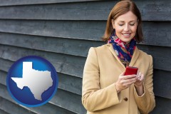 texas map icon and middle-aged woman using a cell phone