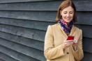 middle-aged woman using a cell phone